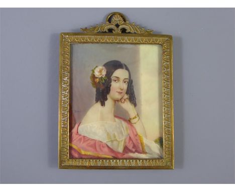 A Fine 19th Century Portrait Miniature, a beautiful young woman, approx 5 x 6 cms, presented in a brass frame.&nbsp;