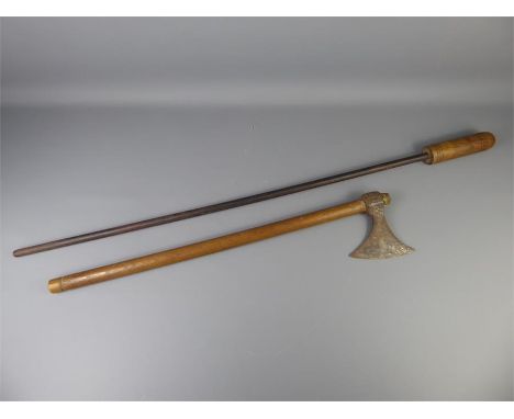 A 19th Century North Indian Axe, approx 67 cms together with a muzzle-loading ramrod, approx 100 cms. (2)