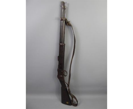 Circa 1885 Martini Henry Carbine Rifle, pop up ladder sights, complete with leather sling. Provenance: The owner of this coll