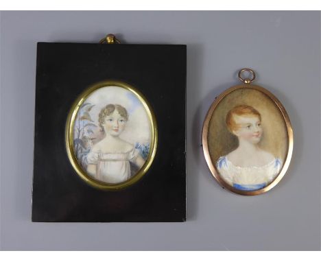 A Fine 19th Century Oval Portrait Miniature, a titian-haired little girl, approx 6 x 7.5 cms together with another oval minia