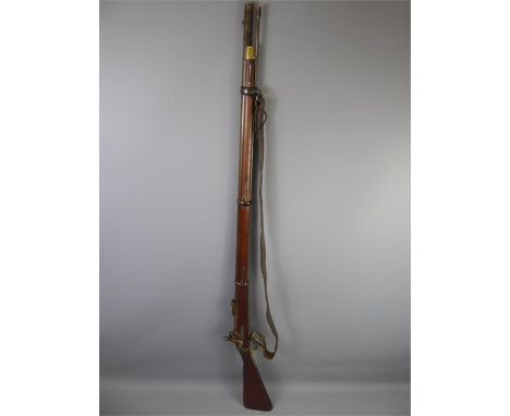 A Victorian Three Band Snider Enfield Percussion Rifle, steel barrels, with hinged ladder rear sight, stamped with VR Crown &