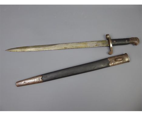 A Victorian Wilkinson Sword Bayonet and Scabbard, with hatched leather grip. Provenance: The owner of this collection excavat