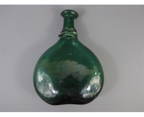 A 19th Century Persian Green Glass Saddle Flask, with applied trailed neck decoration, approx 23 cms.&nbsp;