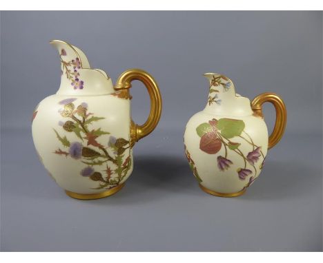 Graduated Royal Worcester Jugs, thistle and blossom design, approx 19 cms high, Rd. nr 29115 1094, the second approx 16 cms h