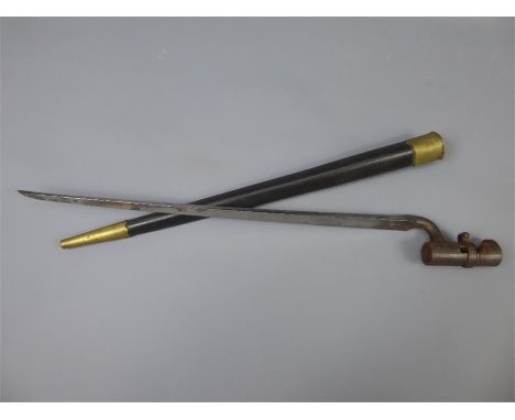 Three Band Snider Enfield Rifle Socket Bayonet, contained within the leather scabbard. Provenance: The owner of this collecti