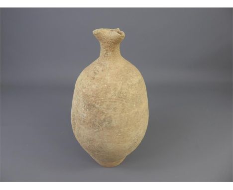 A 2nd Century A.D. Terracotta Mediterranean Bottle Flask, with oinokhae spout, incised with rings, approx 28 cms.&nbsp;