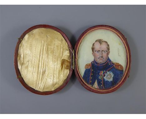 A 19th Century Oval Portrait Miniature, believed to be Napoleon in dress uniform, signed Farrin, approx 6 x 7.5 cms, in maroo