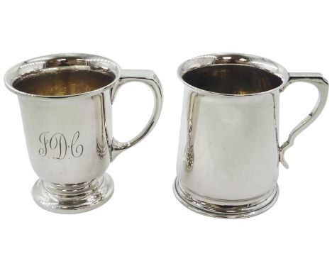 Two 1930's silver christening mugs, the first example of slightly tapering form with lipped rim, flat topped curved handle, u