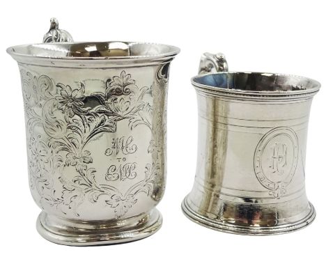 Two Victorian silver Christening mugs, the first example with acanthus scroll handle and engraved monograms to the body surro