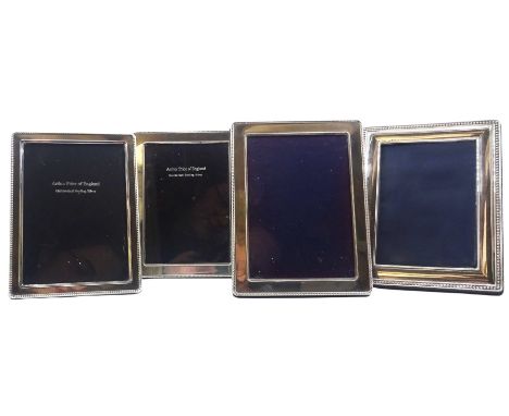 Four modern silver mounted photograph frames, each of rectangular form with beaded edge, and easel style support verso, hallm