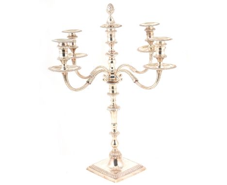 A George II style silver four branch candelabrum, Collingwood &amp; Co, London 1970, with a further centre light and cover, r