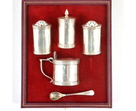 A matched five-piece silver condiments set in the Art Deco style, comprising drum mustard, with shell thumbpiece and blue gla