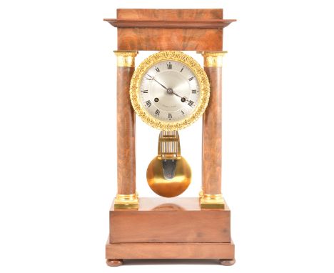 A Charles X mahogany and gilt metal portico clock, signed Pons, Paris, silvered dial signed Pons a Paris, cast gilt metal fol