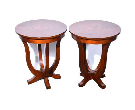 Pair of reproduction walnut lamp tables, circular tops with fan inlay, shaped legs, diameter 51cm, height 62cm.