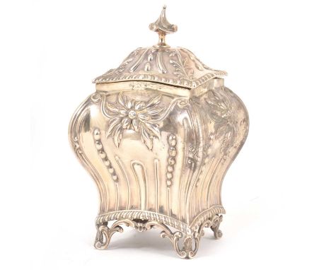 Victorian silver tea caddy, by Hawksworth, Eyre &amp; Co, London 1900, serpentine form with embossed flowers and fluting, 9.5