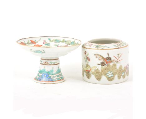 A Chinese porcelain footed dish, 20th century, shallow bowl painted in polychrome enamels with flowers, chipped, diameter 11c