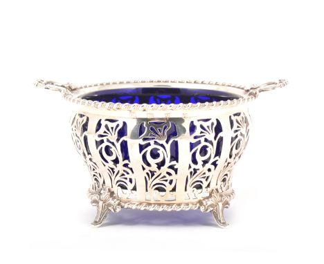 A Victorian style silver basin, Lowe &amp; Son, Chester 1958, rounded ogee shape with pierced sides and twin handles, gadroon