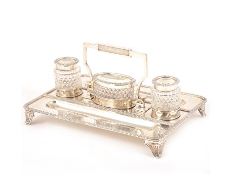 An Edwardian silver inkstand, Elkington &amp; Co, Birmingham 1903, rectangular form with swing carrying handle, gadrooned out