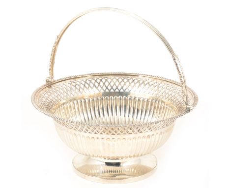 A George III circular silver dessert basket, Paul Storr, London 1798, , pierced and semi-fluted rounded bowl with gadrooned r