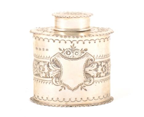 A Victorian silver tea caddy, Colen Hewer Cheshire, Birmingham 1897, over straight sided form with a chased foliate band and 