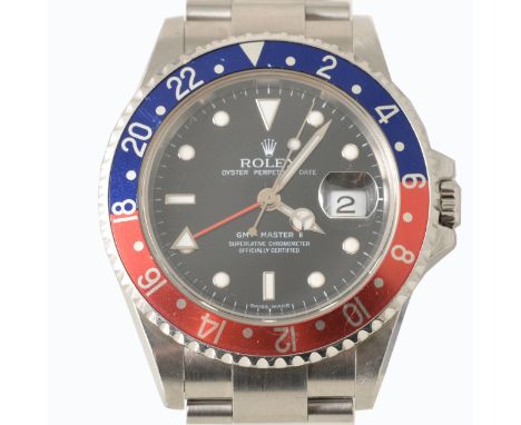 Rolex - A gentleman's GMT Oyster Perpetual Date GMT Master II wrist watch with "Pepsi" bezel, 30mm black dial with luminous d