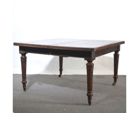 Victorian mahogany windout dining table by Edwards &amp; Roberts, the top with moulded edge and rounded corners, plain frieze