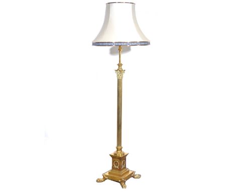 Brass Corinthian column standard lamp, with shade, height 175cm.