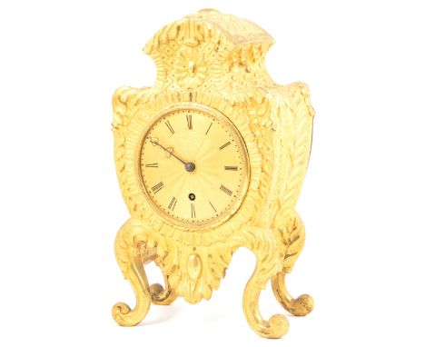 A George II style gilt metal mantel clock, Gorham, Kensington, circa 1840, cartouche shape case, gilt dial with engine turnin