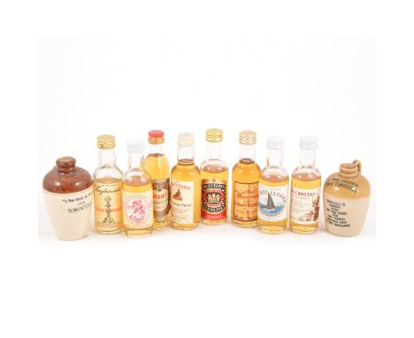 A collection of whisky miniatures, approximately 200 bottles, mostly 1980s/90s bottlings, including ceramic stoneware bottles