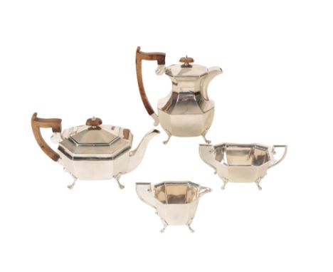 SILVER FOUR-PIECE SILVER TEA SET, by Viner’s, Sheffield, 1933, shaped oval form, hinged cover with wooden disc finial, wooden