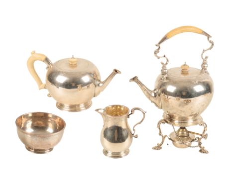 FOUR-PIECE SILVER TEA SET, by Goldsmiths and Silversmiths, London, 1928, comprising a kettle on stand, teapot, milk jug and s