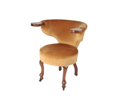 WALNUT "COCKFIGHTING" CHAIR with a "U"-shaped back over a compass-shaped seat, on cabriole front legs and castors, 77cm wide 