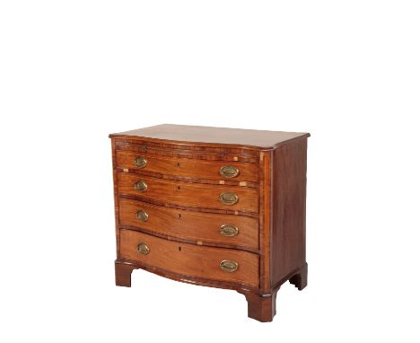 GEORGE III MAHOGANY AND CROSS BANDED SERPENTINE COMMODE circa 1800, the shaped moulded top above a brushing slide and four lo