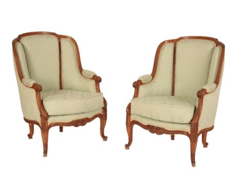 PAIR OF LOUIS XV STYLE FAUTEUIL, the frames carved with stiff acanthus leaves and scale-work, on cabriole front legs with knu