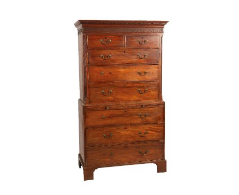 GEORGE III MAHOGANY CHEST ON CHEST of Chippendale design, the upper section with a moulded and key pattern cornice over a ped