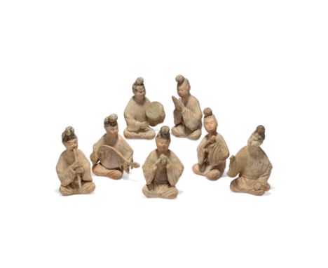 A Chinese painted pottery ensemble of seven kneeling musicians Tang dynastyEach well formed with vivacious facial expression,