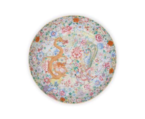 A large Chinese millefleur famille rose dishRepublic periodDecorated with a dragon and phoenix on a dense floral gilt heighte