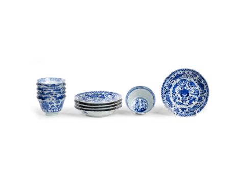 Six Chinese blue and white 'floral' cups and five 'sea creatures' saucersLate Qing dynasty, apocryphal Kangxi marksBoth sets 