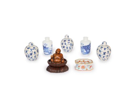 Five Chinese blue and white vases, a famille rose stand and a wood figurative carvingQing dynasty, 19th centuryComprising a p