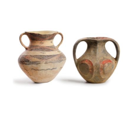 Two small Chinese painted pottery jarsNeolithic period - Han dynastyThe first, a baluster shape with twin handles flanking th