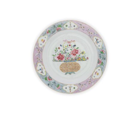 A large Chinese famille rose 'flower basket' serving platterQing dynasty, 18th centuryBrightly enamelled to the centre with a