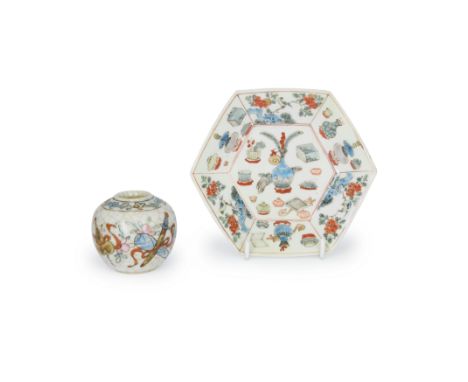 A Chinese famille verte saucer and a water potQing dynasty, 18th - 19th centuryThe 18th century hexagonal saucer painted with