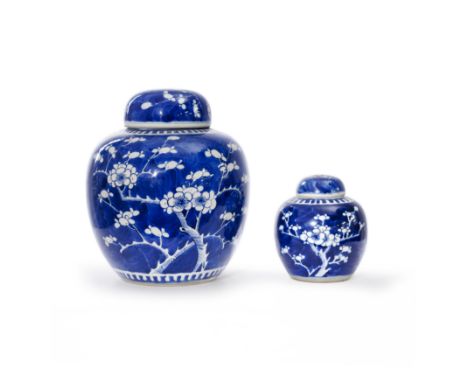 Two Chinese blue and white prunus jars and coversQing dynasty, 19th centuryEach similarly painted with blossoming prunus tree