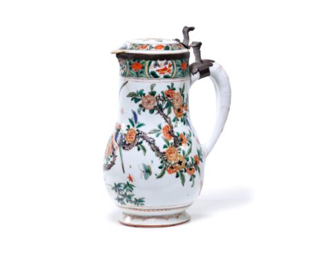 A Chinese famille verte coffee potQing dynasty, Kangxi periodDecorated to the body with birds and bees amidst blossoming thre