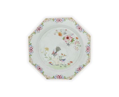 A Chinese famille rose 'peacocks' octagonal serving platterQing dynasty, Qianlong periodEnamelled to the centre with a couple
