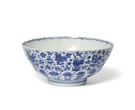 A Chinese blue and white moulded 'floral' bowlQing dynasty, Kangxi periodThe circular bowl moulded with two rows of lappets a