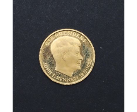 A gold medal or coin, Kennedy Memorial, obverse portrait r. U.S.A. President, John F. Kennedy 1917-63, reverse Kennedy Memori