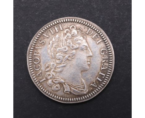 A James VIII silver guinea, laureate and draped bust r. within Jacobus VIII Dei Gratia. Reverse with crowned cruciform shield