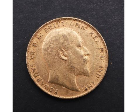 An Edward VII Sovereign, bare head bust r. St George and the Dragon reverse, dated 1910. *CR Marking and rubbing to both surf