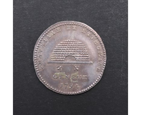 A 5 Centimes piece from the City of Geneva, obverse with a bee hive with two bees below, 'Geneve 1794', reverse 'Les Heures S